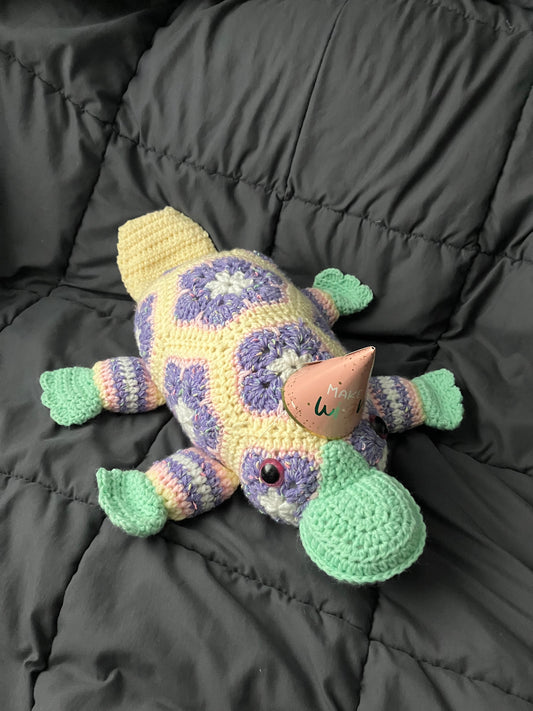 Sprinkles (Petal-pus crochet platypus)